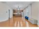 Open-concept space with eat in kitchen, stainless steel appliances, and hardwood floors at 209 Palmetto Walk Dr, Summerville, SC 29486