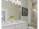 This bathroom boasts a double sink vanity, large mirror, and glass-enclosed shower at 209 Somerset Acres Dr, Summerville, SC 29486