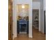 A stylish bar niche features custom tile, a wine cooler, and ample storage, perfect for entertaining guests at 2225 Black Oak Court, Mount Pleasant, SC 29466