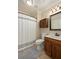 A well-lit bathroom with a shower and tub combination, a vanity, and a stylish medicine cabinet at 2225 Black Oak Court, Mount Pleasant, SC 29466