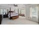 The primary bedroom features natural light, a ceiling fan, carpet and vaulted ceilings at 2225 Black Oak Court, Mount Pleasant, SC 29466
