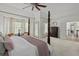 Spacious bedroom has natural light, crown molding, carpet, ceiling fan and ensuite bathroom at 2225 Black Oak Court, Mount Pleasant, SC 29466