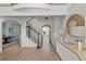 Grand foyer with hardwood floors, elegant staircase, and sophisticated decor at 2225 Black Oak Court, Mount Pleasant, SC 29466