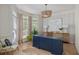 Bright office with bay window, custom desk, and elegant decor at 2225 Black Oak Court, Mount Pleasant, SC 29466