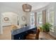 Bright office with bay window, custom desk, and elegant decor at 2225 Black Oak Court, Mount Pleasant, SC 29466