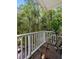 Covered porch overlooking backyard with lush landscaping at 2225 Black Oak Court, Mount Pleasant, SC 29466