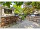 Outdoor space with patio, grill area, outdoor kitchen, and ample seating at 225 Delahow St, Daniel Island, SC 29492