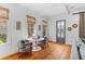 Cozy dining area features hardwood floors, white walls, and natural light at 225 Delahow St, Daniel Island, SC 29492