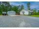 Spacious driveway with a detached garage and ample parking for multiple vehicles at 229 Twin Lake Dr, Summerville, SC 29483