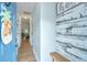 Hallway features wood floors, light-colored walls, an open door, and a pineapple door decoration at 229 Twin Lake Dr, Summerville, SC 29483