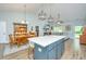 Open-concept kitchen with large island and adjacent dining area, perfect for entertaining and everyday living at 229 Twin Lake Dr, Summerville, SC 29483