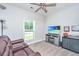 Living room features a leather recliner, TV, and a window with natural light at 229 Twin Lake Dr, Summerville, SC 29483