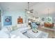 Open-concept living room with vaulted ceiling, modern furnishings and seamless flow to kitchen and dining areas at 229 Twin Lake Dr, Summerville, SC 29483