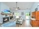 Comfortable living room featuring a stone fireplace, soft lighting, and stylish decor at 229 Twin Lake Dr, Summerville, SC 29483