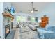 Bright and airy living room featuring a cozy fireplace, plush seating, and stylish accents at 229 Twin Lake Dr, Summerville, SC 29483