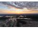 Beautiful aerial view of a neighborhood with lakes and a colorful sunset at 234 Basket Grass Ln, Summerville, SC 29486