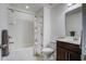 Bright bathroom featuring a shower-tub combo, dark vanity and Paris themed shower curtain at 234 Basket Grass Ln, Summerville, SC 29486