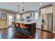 Bright kitchen with large island, stainless steel appliances, and seamless access to the backyard at 234 Basket Grass Ln, Summerville, SC 29486