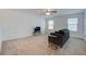 Neutral living room with lots of light, a ceiling fan, and television at 234 Basket Grass Ln, Summerville, SC 29486