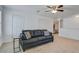 Living room featuring neutral colors, ceiling fan, and two doors at 234 Basket Grass Ln, Summerville, SC 29486