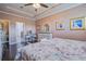 Spacious main bedroom boasts beautiful decor and dark wood flooring at 234 Basket Grass Ln, Summerville, SC 29486