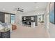 Spacious bonus room featuring a built-in desk, neutral decor, and lots of natural light at 238 Silk Oak Dr, Moncks Corner, SC 29461