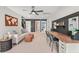 Comfortable bonus room with a study area, sofa, and stylish decorations throughout at 238 Silk Oak Dr, Moncks Corner, SC 29461