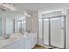 Bathroom featuring double sinks and a glass-enclosed shower at 306 Lucca Dr, Summerville, SC 29486