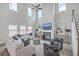 Bright, airy living room with fireplace, large windows and vaulted ceiling at 306 Lucca Dr, Summerville, SC 29486