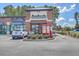 Exterior shot of a Smoothie King location next to Edward Jones, with convenient drive-thru and parking at 306 Lucca Dr, Summerville, SC 29486