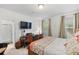 Bedroom featuring a bed with floral bedding, and a desk area at 3121 Harding Ct, Johns Island, SC 29455