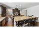Gourmet kitchen with a large island, bar seating, and views into the adjacent living spaces at 3121 Harding Ct, Johns Island, SC 29455