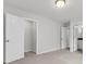 Spacious bedroom with carpet, an open closet, and access to the bathroom at 319 Abercom Place Dr, Moncks Corner, SC 29461