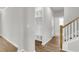 Inviting entryway boasts a convenient mudroom area and hardwood floors at 319 Abercom Place Dr, Moncks Corner, SC 29461