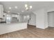 Open concept kitchen boasts a large island and stainless steel appliances at 319 Abercom Place Dr, Moncks Corner, SC 29461