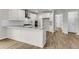 Stylish kitchen featuring an island, white cabinets, and stainless steel appliances at 319 Abercom Place Dr, Moncks Corner, SC 29461