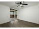 Bedroom with wood-look flooring, a sliding glass door and a ceiling fan at 335 Macgregor Dr, Summerville, SC 29486