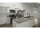 Modern kitchen with stainless steel appliances, granite countertops and white cabinetry at 335 Macgregor Dr, Summerville, SC 29486