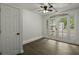 Bright room with neutral walls, wood-look flooring and large glass doors to the outside at 335 Macgregor Dr, Summerville, SC 29486