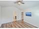 Bright bedroom with vaulted ceiling, ceiling fan, wood-look floors, and ensuite bathroom at 3367 Eastman Dr, Mount Pleasant, SC 29466
