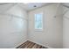 Walk-in closet with metal shelving and a window providing natural light at 3367 Eastman Dr, Mount Pleasant, SC 29466