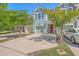 Charming townhome with a blue shingle exterior, red front door, and well-maintained landscaping at 3367 Eastman Dr, Mount Pleasant, SC 29466