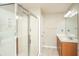 Clean bathroom featuring a glass-enclosed shower and a vanity with ample storage at 3517 Claremont St, Mount Pleasant, SC 29466