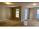 Spacious bedroom with carpet, natural light from the windows, and a door to the outside at 3517 Claremont St, Mount Pleasant, SC 29466