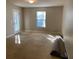 Bedroom with sunlight streaming in, carpeted floor, leading to a private patio area at 3517 Claremont St, Mount Pleasant, SC 29466