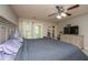 Cozy bedroom with a ceiling fan and access to a private outdoor balcony at 3517 Claremont St, Mount Pleasant, SC 29466