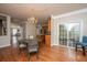 Charming dining area with hardwood floors, a chandelier, and sliding glass doors to the outside at 3517 Claremont St, Mount Pleasant, SC 29466