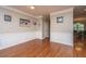 Charming dining area featuring hardwood floors and wainscoting at 3517 Claremont St, Mount Pleasant, SC 29466