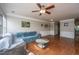 Open concept living room with hardwood floors, neutral walls and lots of charm at 3517 Claremont St, Mount Pleasant, SC 29466