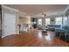 Spacious living room with hardwood floors, large windows, and modern furnishings at 3517 Claremont St, Mount Pleasant, SC 29466